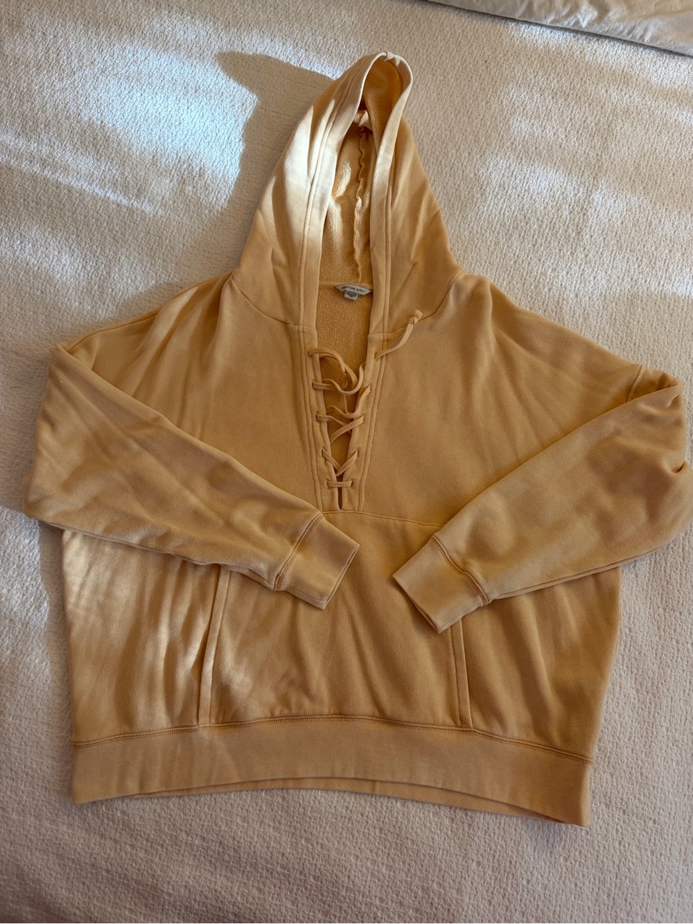 American Eagle Outfitters Lace-Up Hooded Pullover in Light Mustard